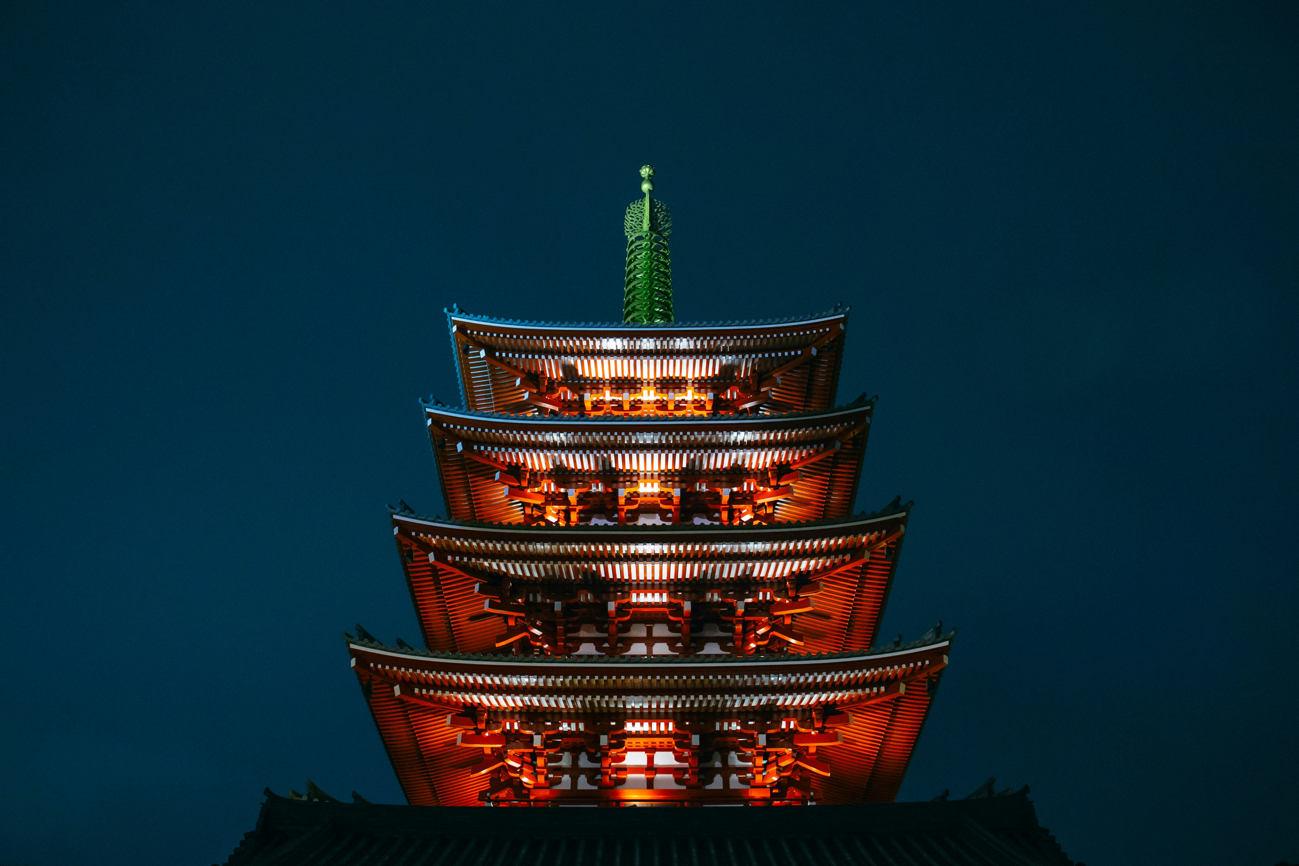 photo of red pagoda during nighttime
